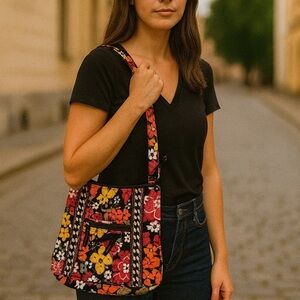 Vera Bradley Crossbody bag in the “bittersweet” floral pattern cotton adj strap